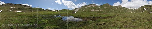 P005345: Panoramic picture of mountain lake in undulating mountain scenery